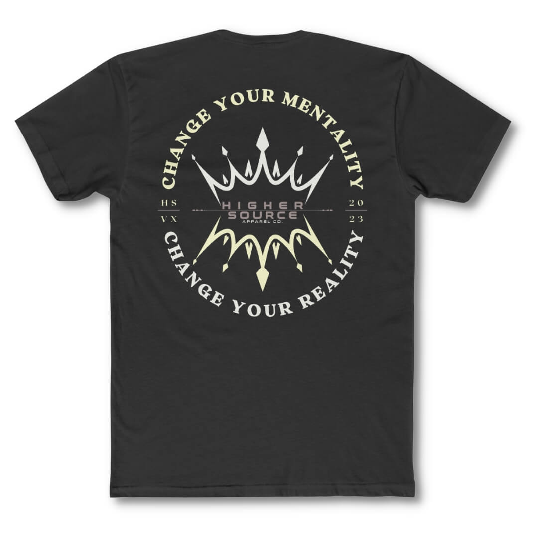 Back side of a black higher source apparel t shirt with "change your mentality, change your reality in an oval pattern. The font is light yellow and white with two crowns in the center.