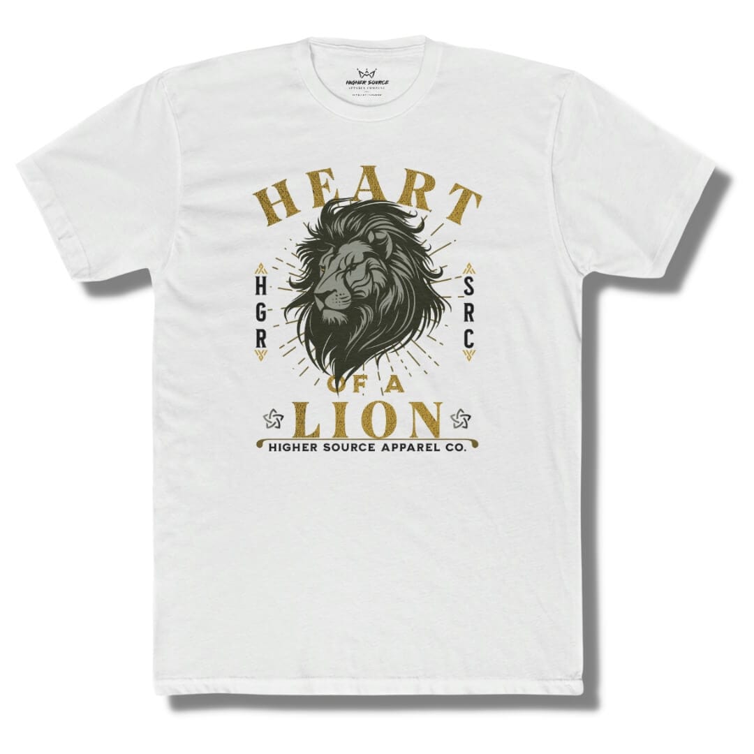 Front side of a white higher source apparel t shirt with “heart of a lion” in lemon curry and black font. There is an image of a black and grey lion’s head in the center. Higher source apparel company is printed in black font at the bottom.