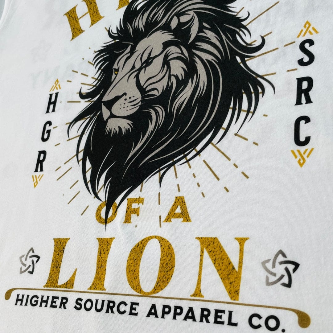 A close up of a higher source apparel t shirt with a large lion head in the center.
