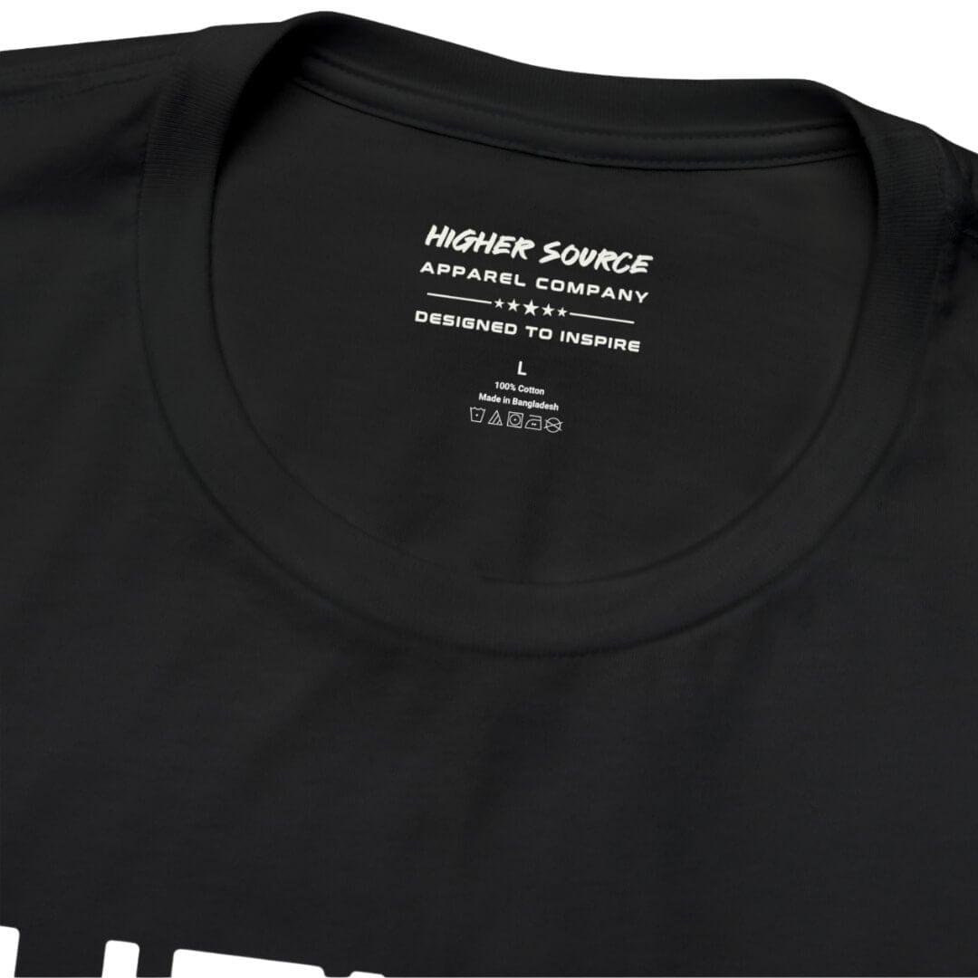 The inside neck label of a black higher source apparel t shirt