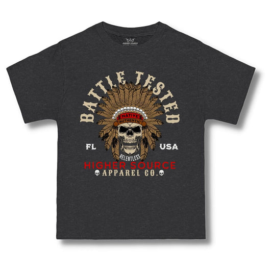 Front side of a charcoal heather grey higher source apparel oversized t shirt with battle tested in large dark vanilla font and an apache skull in the center. Higher Source apparel company is at the bottom in red and dark vanilla font.