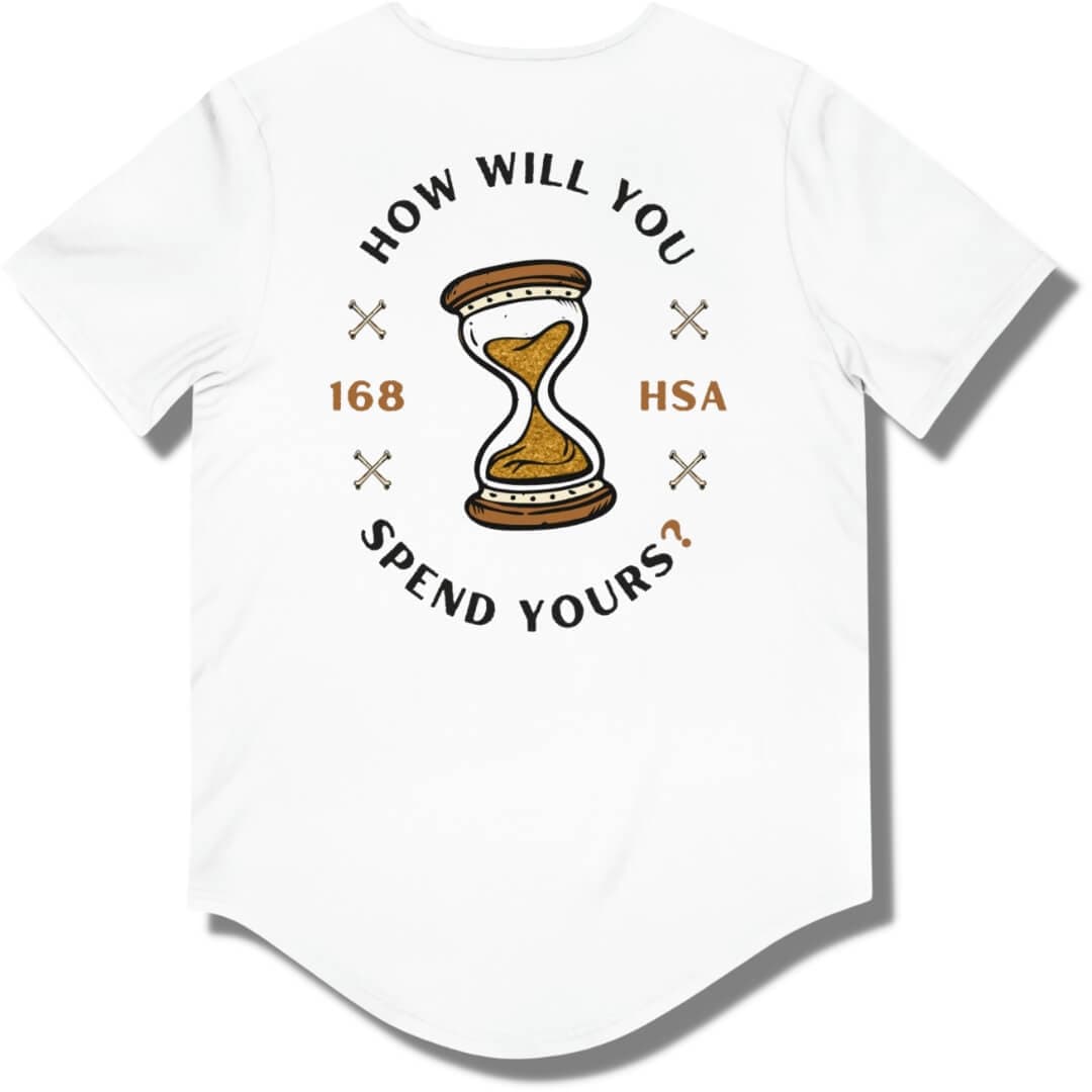Back side of a white curved hem t shirt with "how will you spend yours" in an oval shape. The font is in black and gold with an hour glass in the center.