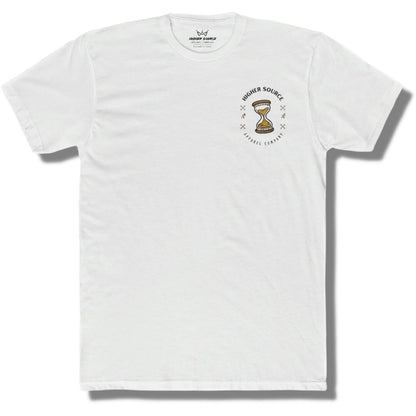 Front side of a white t shirt with higher source logo in black font and a dark gold hour glass in the upper left breast area.