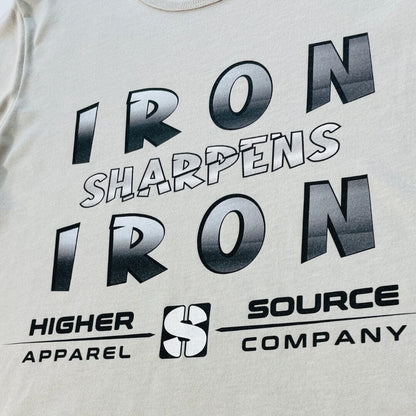 Iron sharpens iron in large black and american silver font. Higher source apparel company is written in black font below
