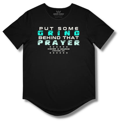 Front side of a black curved hem t shirt with “put some grind behind that prayer” in white, bright turquoise, and aero blue.