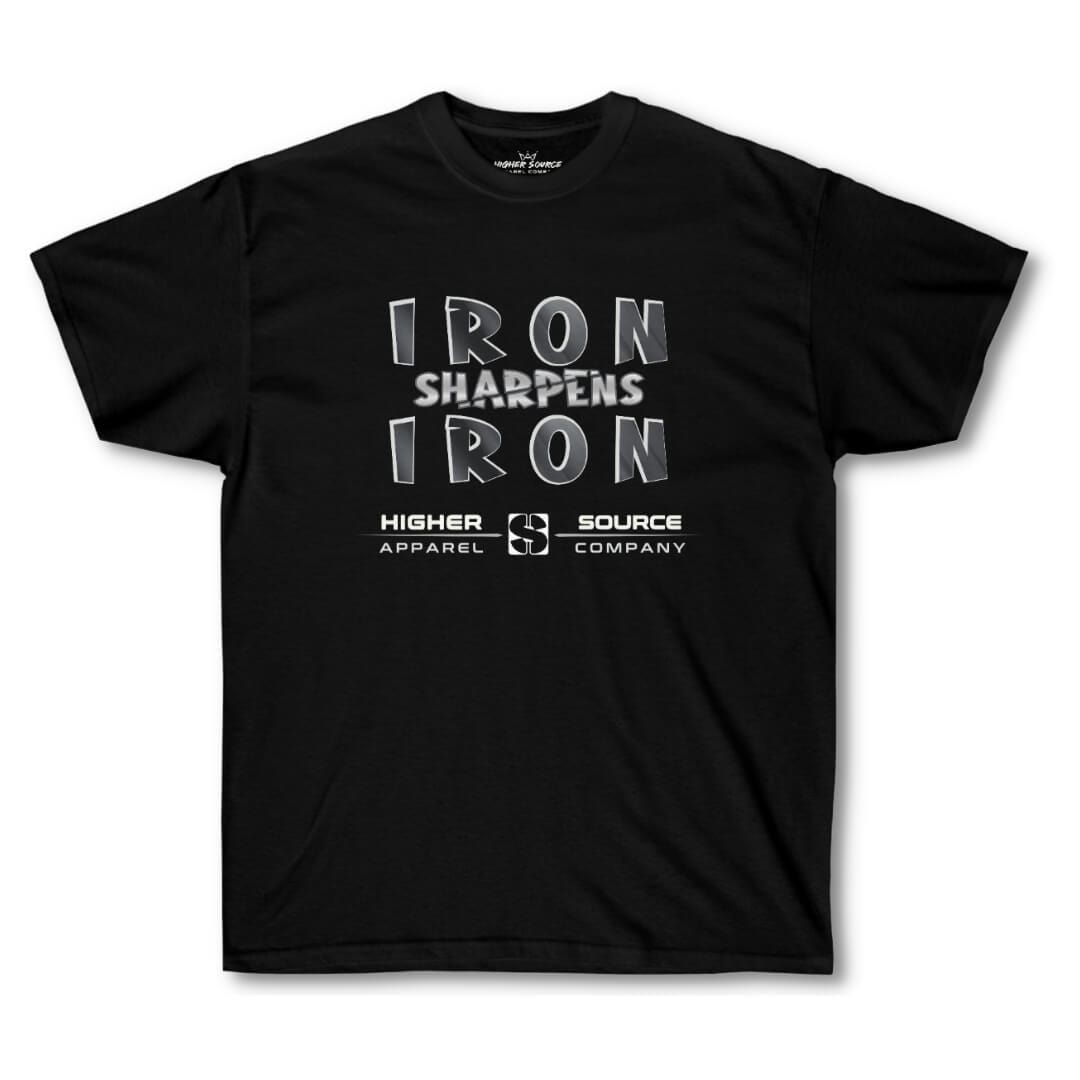 Front side of a women's higher source apparel slightly oversized black t shirt with “iron sharpens iron” in bold black and American silver font and higher source apparel company below in black font.