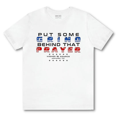 Front side of a white higher source apparel women’s t shirt with “put some grind behind that prayer” in rosso corsa red, black and blue font. The higher source logo is below in black font.