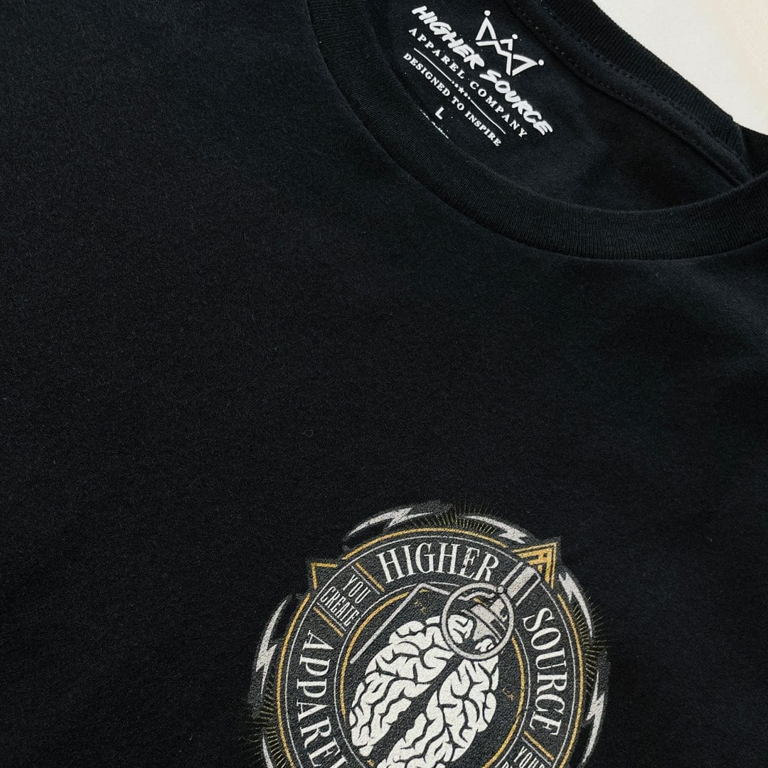 A black higher source apparel shirt with a circular logo on the left breast. The logo is in white font and a brain grenade in white.